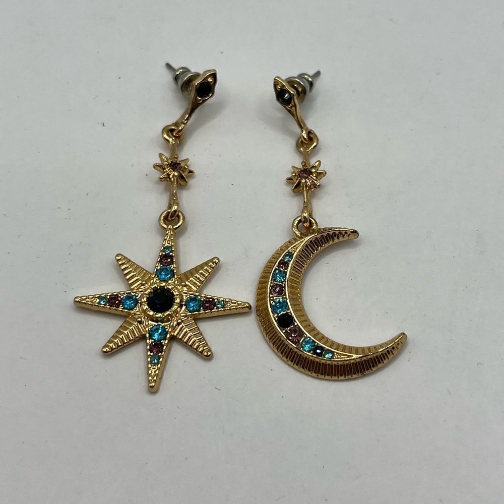 Celestial gold tone with color stones drop earrings.